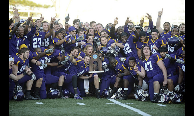 Ashland University with the GLIAC championship trophy after Saturday's game against Notre Dame at Jack Miller Stadium. Photo by Sarah Gordon